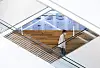 A medical professional on an escalator inside a general hospital in Seoul on Wednesday. [NEWS1]
