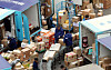 Delivery workers prepare parcels for shipment at a logistics center in Seoul on Nov. 13, 2020. [NEWS1]