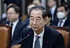 Impeached Prime Minister Han Duck-soo speaks during a parliamentary questioning session at the National Assembly in western Seoul on Jan. 15. [NEWS1]