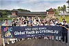 Students pose for a photo against the backdrop of Woljeonggyo Bridge on July 3. [PARK SANG-MOON]