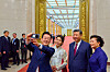 From left, President Lee Jae Myung takes a selfie with first lady Kim Hea Kyung, Chinese President Xi Jinping and first lady Peng Liyuan with a Xiaomi smartphone during a state dinner at the Great Hall of the People in Beijing on Jan. 5. [JOINT PRESS CORPS]