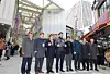 Seoul Mayor Oh Se-hoon, center, and other officials pose for a photo during a groundbreaking ceremony for the Namdaemun Market arcade at the market in Jung District, central Seoul, on Nov. 17. [NEWS1]