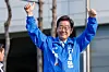 Lee Jae-myung, the Democratic Party presidential candidate, greets supporters after finishing a campaign speech in Namyangju, Gyeonggi, on May 26. [NEWS1]