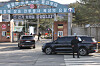BTS's Jimin and Jungkook pass through the gate of a military boot camp in Yeoncheon County, Gyeonggi, where they will receive basic training in black SUVs on Tuesday.[YONHAP]