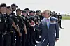 King Charles interacts with police officers while departing after a two-day visit in Ottawa on May 27. [AP/YONHAP]