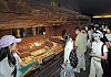 Students view the golden accessories displayed inside Cheonmachong on July 3. [PARK SANG-MOON]