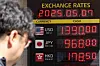 An electronic board displays exchange rates at a currency exchange booth in Myeong-dong of Jung District, central Seoul, on May 7. [YONHAP]