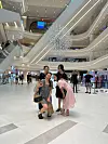 Thu Giang, a 34-year-old, takes a selfie on the ground floor at Lotte Mall West Lake Hanoi on Thursday. [SEO JI-EUN]