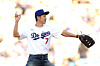 Los Angeles FC forward Son Heung-min throws the ceremonial first pitch before the game between the Los Angeles Dodgers and the Cincinnati Reds at Dodger Stadium on Aug. 27 in Los Angeles. [AFP/YONHAP]