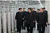 Kim Jong-un (middle) inspects a nuclear material production base and a nuclear weapons research facility on Jan. 29. [NEWS1]