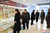 Kim Jong-un, second from left, tours newly built facilities in Gangdong County, on the outskirts of Pyongyang, with his daughter Kim Ju-ae, left, on Dec. 15. [KOREAN CENTRAL NEWS AGENCY]