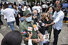 Colonel Valdez speaks to reporters at the National Institute of Forensic Pathology in Santo Domingo, Dominican Republic on April 9, while holding photos of people who remain missing after a roof collapsed at the Jet Set nightclub during a merengue concert. [AP/YONHAP]