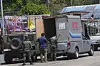 A Thai soldier inspects a truck at a checkpoint to prevent trafficking along the border with Myanmar in Mae Sot, Thailand on Feb. 26. [AP/YONHAP]
