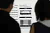 Visitors to the semiconductor exhibition hall at the National Science Museum in Gwacheon, Gyeonggi look at explanations about the graphics processing unit (GPU) and high-bandwidth memory (HBM) structures on Aug. 7. [YONHAP]