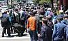Older adults wait in line for free meals at Tapgol Park in Jongno District, central Seoul, on May 12. [NEWS1]