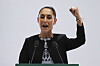 Mexican President Claudia Sheinbaum raises her fist at the end of her first state-of-the-nation address at the National Palace in Mexico City on Sept. 1. [AP/YONHAP]