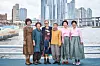 Director Sue Kim, third from left, and the haenyeo of documentary film 'The Last of the Sea Women' pose for a photo. From left, haenyeo Kang Joo-hwa, Jeong Young-ae, director Kim, haenyeo Lee Geum-ok, Hyun In-hong and Park In-sook [APPLE TV+]