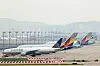 Asiana Airlines aircraft are parked at Incheon International Airport on Sept. 11. [YONHAP]