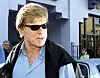 Actor Robert Redford arrives at Cuba's Cinemateca for the premiere of his film ″The Motorcycle Diaries″ about Che Guevara's trip through South America, in Havana, Jan. 25, 2004. [AFP/YONHAP]