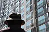 A pedestrian on April 15 walks by the apartment where a man in his 50s killed five family members in Yongin, Gyeonggi. [NEWS1]