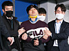 Cho Ju-bin, convicted of blackmail and sexual harassment, is transferred to prosecutors in Seoul on March 25, 2022. [JOONGANG ILBO]