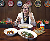Italian Ambassador to Korea Emilia Gatto demonstrates the che buono gesture as she poses with Italian dishes during an interview with the Korea JoongAng Daily at Cornerstone restaurant in Gangnam District, southern Seoul, on Nov. 5. [PARK SANG-MOON]