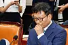 Qoo10 founder and CEO Ku Young-bae attends a hearing at the National Assembly in western Seoul on July 30. [NEWS1]