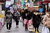 Foreign tourists are seen on the streets of Myeongdong in central Seoul on Feb. 24. [NEWS1]
