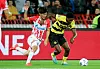 Red Star Belgrade's Hwang In-beom, left, vies for the ball with Young Boy's Joel Monteiro during a UEFA Champions League Group G match in Belgrade, Serbia on Oct. 4, 2023. [XINHUA/YONHAP]