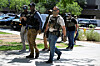 Masked law enforcement officers, including HSI and ICE agents, walk into an immigration court in Phoenix, Arizona, on May 21, 2025, in this file photo.  [REUTERS/YONHAP]