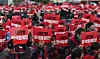 Workers of the Korean Confederation of Trade Unions stage a protest demanding President Yoon Suk Yeol's impeachment in Ulsan on Thursday. [YONHAP]