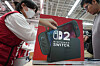 A customers purchases the Nintendo Switch 2 at an electronics retailer in Tokyo on June 5. [AFP/YONHAP]