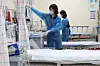 Medical professionals prepare for emergency cases at Korean Armed Forces Capital Hospital in Seongnam, Gyeonggi, on Monday ahead of the mass resignation protest by trainee doctors. Emergency rooms at 12 military hospitals were opened to the public from Tuesday. [NEWS1]