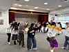 Korean undergraduates and Awa Odori performers dance together in a large circle at Mima City Hall in Tokushima Prefecture, Japan, on Jan. 24. [LEE SOO-JUNG]