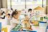 Kids play with toys at a kids’ lounge at DoubleTree by Hilton Seoul Pangyo. [DOUBLETREE BY HILTON SEOUL PANGYO]