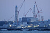 A view of the tsunami-crippled Fukushima Daiichi nuclear power plant as seen from the nearby Ukedo fishing port in Namie town, Fukushima Prefecture, Japan March 10, on the eve of the day marking 14-year anniversary of the 2011 earthquake and tsunami disaster, in this photo taken by Kyodo. [REUTERS/YONHAP]