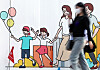 A pedestrian walks past a barrier at a construction site decorated with a drawing of a family on Wednesday. [NEWS1]