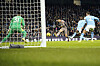 Tottenham's Son Heung-min, center, scores the opening goal during a Premier League match against Manchester City and at the Etihad in Manchester on Sunday.  [AP/YONHAP]