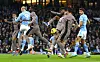 Tottenham's Son Heung-min, wearing the No. 7, scores an own goal during a Premier League match against Manchester City and at the Etihad in Manchester on Sunday. [REUTERS/YONHAP]