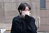 Former President Moon Jae-in's daughter Moon Da-hye walks out of Seoul Western District Court in Mapo District, western Seoul, on March 20. [NEWS1]