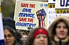People rally at Health and Human Services headquarters to protest the polices of U.S. President Donald Trump and Tesla and X owner Elon Musk on Feb. 19 in Washington. [AP/YONHAP]