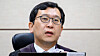 Presiding Judge Lee Jin-gwan hears the first trial in the case involving former Prime Minister Han Duck-soo over charges including aiding and abetting the alleged ringleader of an insurrection and perjury at the Seoul Central District Court in Seocho District, southern Seoul, on Sept. 30, 2025. [NEWS1]