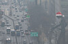 Fine dust pollution shrouds Seoul as seen from the Seoul Metropolitan Office of Education in Jongno District, central Seoul, on Dec. 7. [YONHAP]