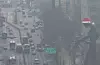 Fine dust pollution shrouds Seoul as seen from the Seoul Metropolitan Office of Education in Jongno District, central Seoul, on Dec. 7. [YONHAP]
