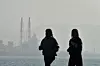 Citizens run along a coastal road in Buk District, Pohang, North Gyeongsang, on Dec. 10, as fine dust levels in the area reached around 60 micrograms per cubic meter. [NEWS1]