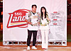 Former baseball player Choo Shin-soo, left, poses with his wife, Ha Won-mi, during his retirement ceremony at Incheon SSG Landers Field in Incheon on June 14. [YONHAP]