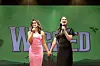 Actors Courtney Monsma and Sheridan Adams perform a song together during a joint interview with the cast of the musical ″Wicked.″ [S&CO]