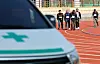 Applicants for a wildfire suppression team carry backpack pumps during a physical fitness test at Yellow City Stadium in Jangseong County, South Jeolla, on Jan. 23. [YONHAP]