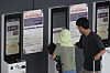 People make a reservation for SRT high-speed train service tickets at Suseo Station in Gangnam District, southern Seoul, on Sept. 22, ahead of the upcoming Lunar New Year holiday in October. The reservation period for trains running from Oct. 2 through Oct. 12 is divided into priority booking for individuals reliant on public transportation and general booking for the public. [YONHAP]