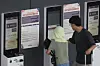 People make a reservation for SRT high-speed train service tickets at Suseo Station in Gangnam District, southern Seoul, on Sept. 22, ahead of the upcoming Lunar New Year holiday in October. The reservation period for trains running from Oct. 2 through Oct. 12 is divided into priority booking for individuals reliant on public transportation and general booking for the public. [YONHAP]